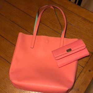 Pink and mint green purse with matching wallet.